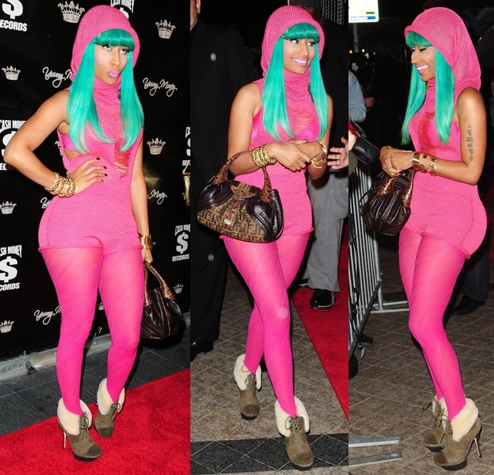 Nicki Minaj is wearing bright pink and bright green but the real highlight of her outfit is of course, her fur cuff boots