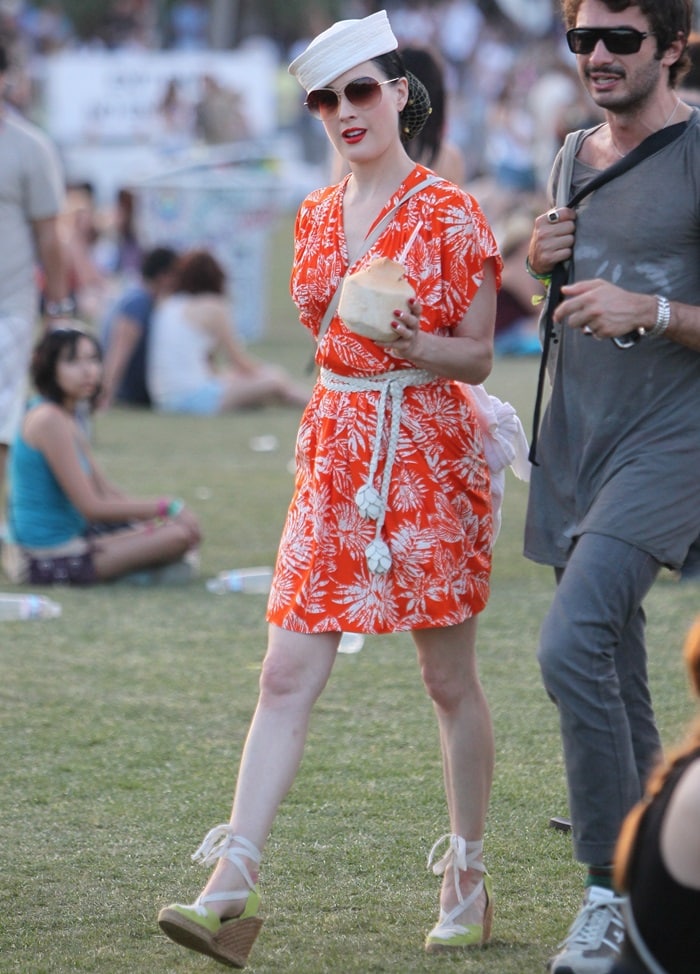 Dita Von Teese opted for a kimono dress and capped off the look with a sailor hat and the same espadrilles