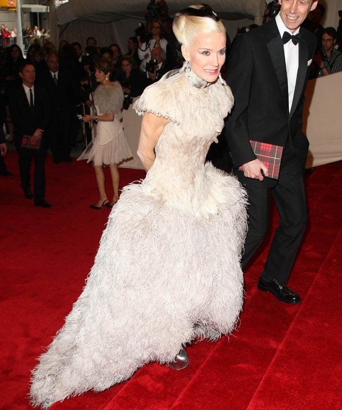 Daphne Guinness in heel-less silver platform Mary Janes