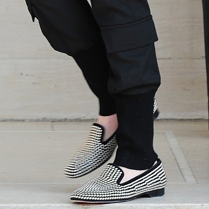 Anne Hathaway's shoes are unmistakably by Christian Louboutin
