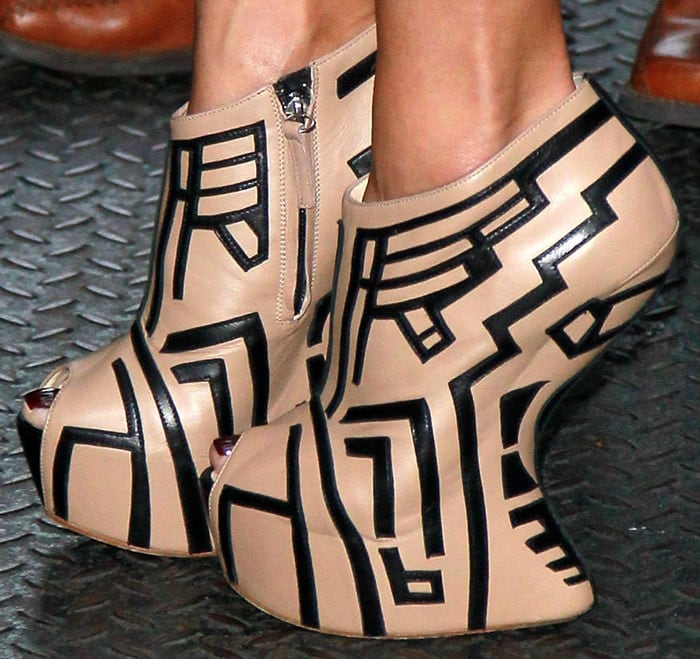 Nicole Scherzinger's geometric beige and black heel-less booties