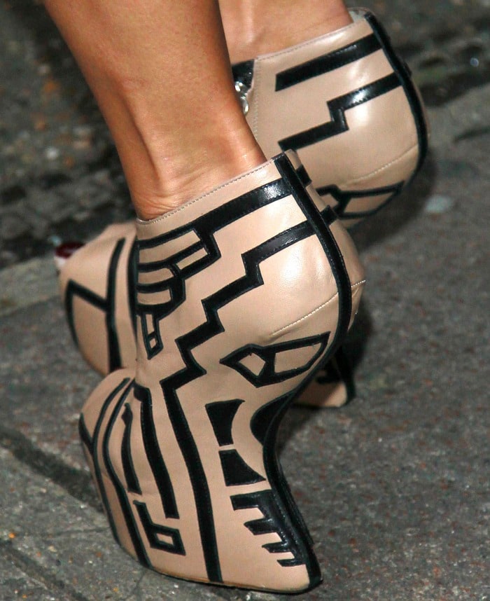 Nicole Scherzinger's geometric beige and black heel-less booties