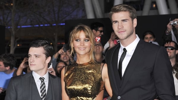 Josh Hutcherson, Jennifer Lawrence and Liam Hemsworth at the World Premiere of 'The Hunger Games' held at Nokia Theatre in Los Angeles, March 13, 2012