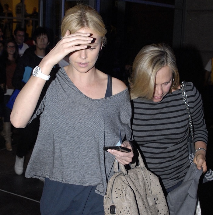 Charlize Theron and her mother Gerta arriving at the Staples Center for the Los Angeles Lakers v San Antonio Spurs game in Los Angeles on April 17 2012