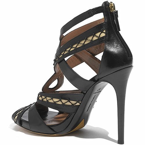 Elegant lacings twine corset-chic across a twisted leather sandal