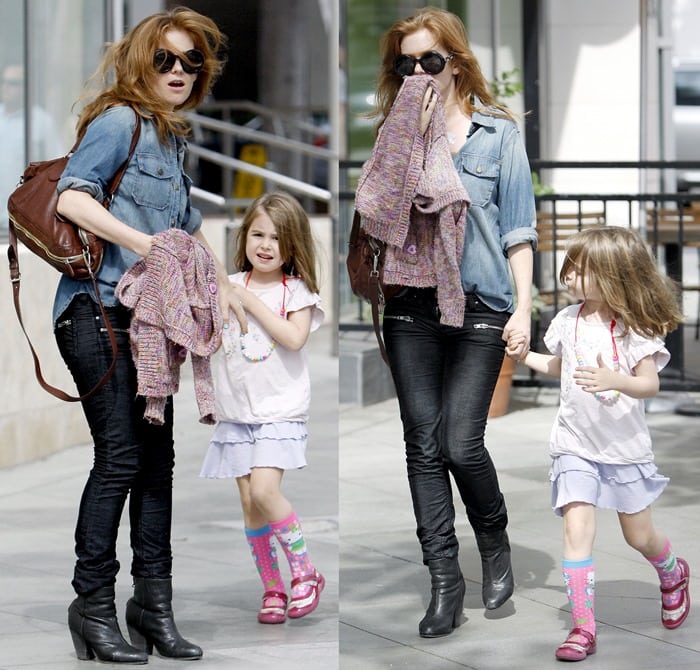 Isla Fisher out and about with her daughter in Santa Monica on October 6, 2012