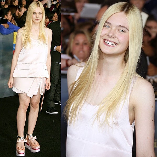 Elle Fanning posing for the cameras at the premiere of The Twilight Saga: Breaking Dawn — Part 2 at Nokia Theatre L.A. Live in Los Angeles, California on November 12, 2012