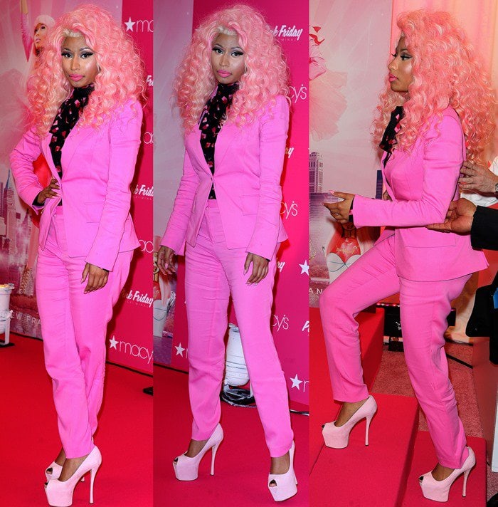 Nicki Minaj wore a fuchsia pink pants suit with a pair of lighter pink Giuseppe Zanotti peep-toe pumps