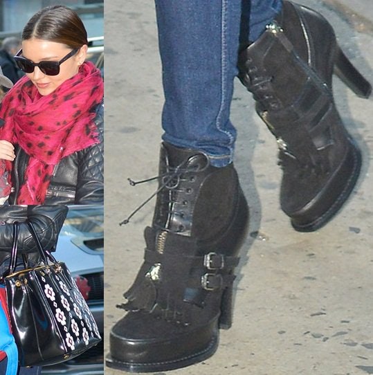 Miranda Kerr rocks ankle boots featuring folded kilties and buckles