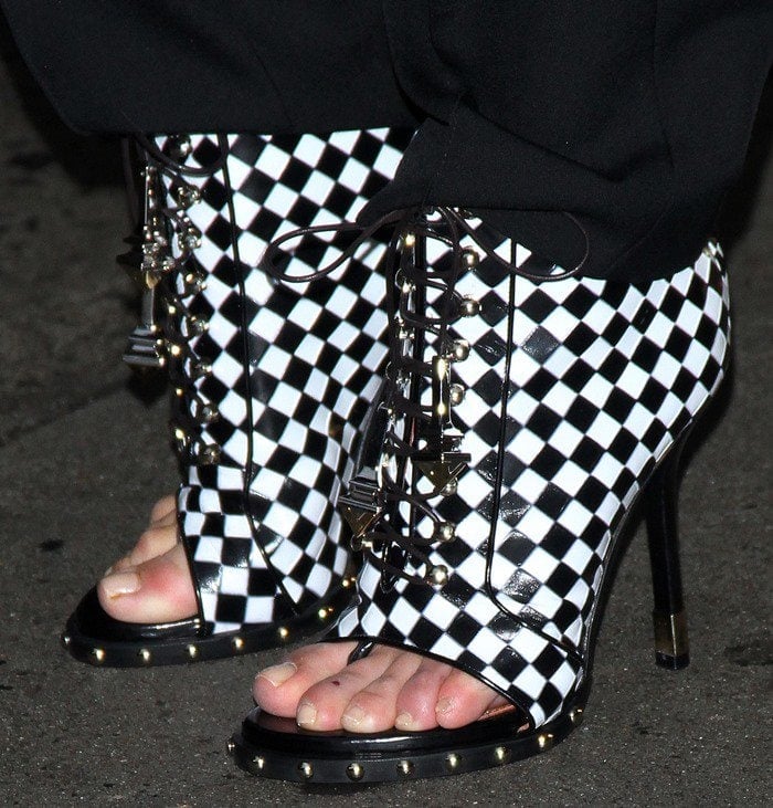 Kim Kardashian in Checkered Givenchy Lace-Up Booties