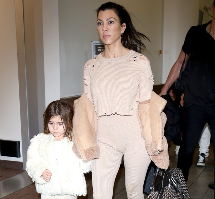 Kourtney Kardashian and Penelope Scotland Disick at Los Angeles International Airport arrivals in Los Angeles, California, on February 4, 2018
