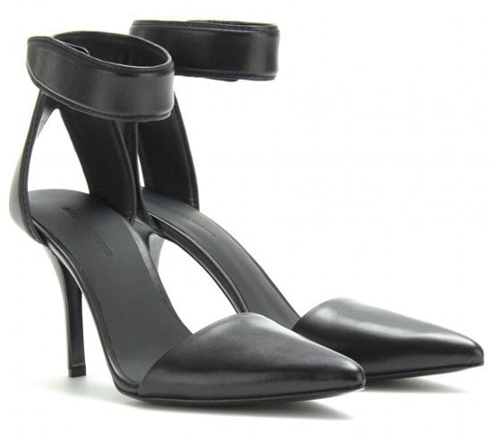 An elegant tapered toe and Velcro® ankle strap lend a sleek, minimalist look to these smooth leather Alexander Wang pumps