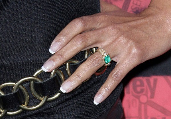 Halle Berry accessorized with a ring and a belt