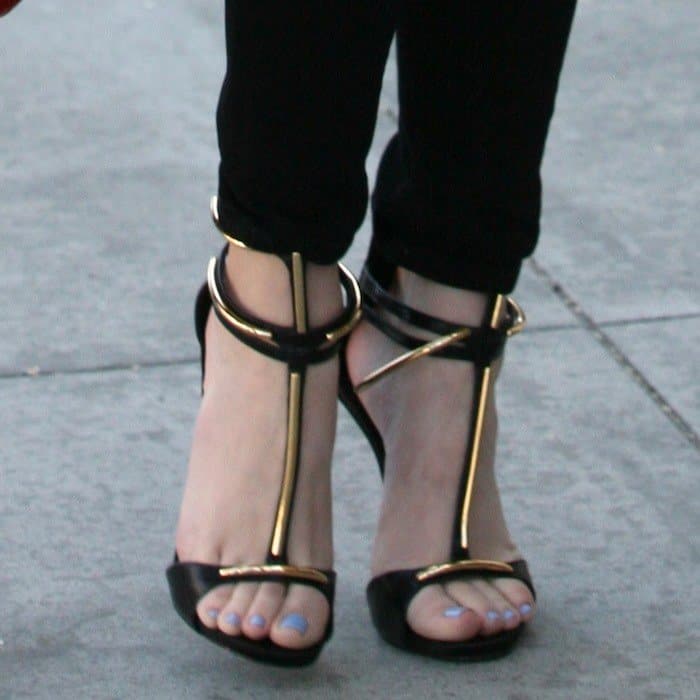 Khloe Kardashian's feet in strappy Giuseppe Zanotti sandals