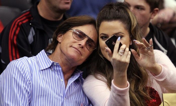 Khloe Kardashian taking a selfie with Bruce Jenner