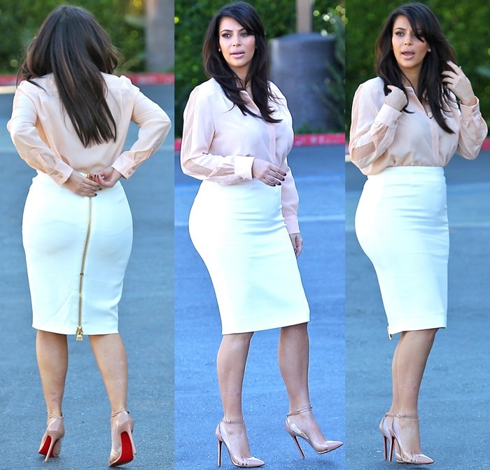 Kim Kardashian sported a white high-waist pencil skirt from Tom Ford with a gold zipper detail in the back paired with a light peachy-pink long-sleeve blouse from Chloé