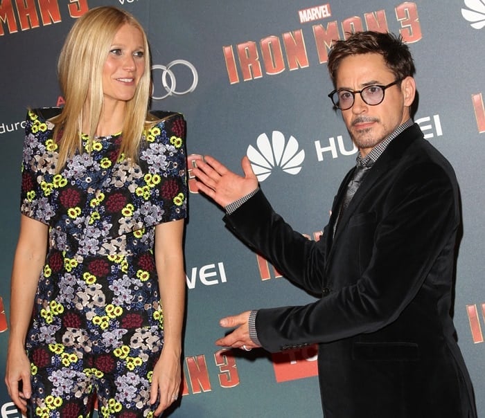 Gwyneth Paltrow and Robert Downey Jr at the premiere of Iron Man 3 held at the Grand Rex theater in Paris on April 14, 2013