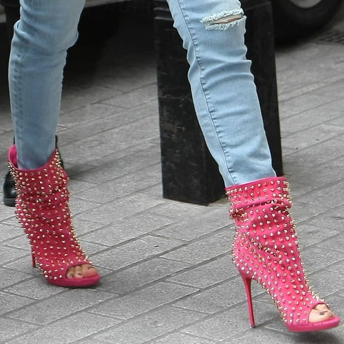 Jennifer Lopez wearing Christian Louboutin's Guerilla boots