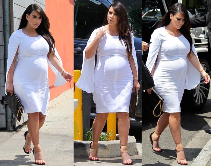 Kim Kardashian styled her heels with a white midi shift dress