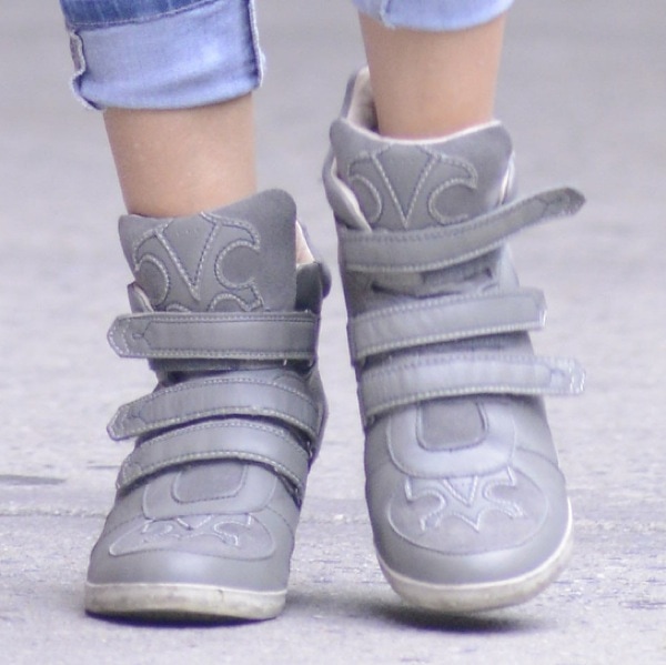 Sarah Jessica Parker wearing gray wedge sneakers from Koolaburra