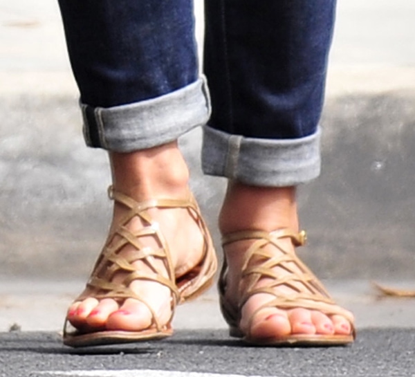 Jordana Brewster sported a pair of patent leather Amalie cage sandals by Tory Burch