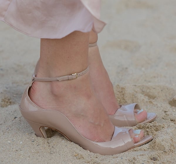 Closeup photos of Katharine McPhee's Brian Atwood heels digging in the sand