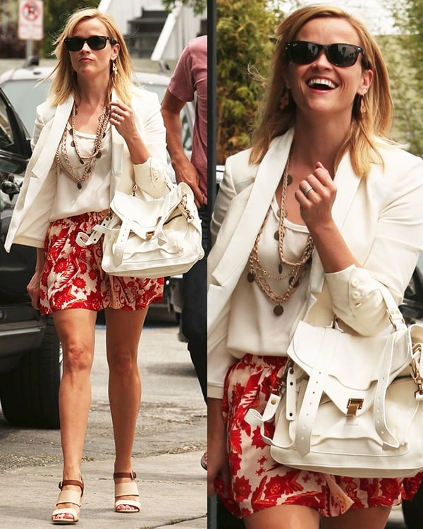 Reese Witherspoon sported a red floral skirt from Rebecca Minkoff