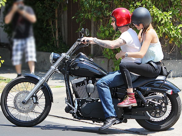 Adam Levine and Behati Prinsloo riding on a motorcycle after having lunch at Mustard Seed Cafe in Los Feliz, California, on August 7, 2012