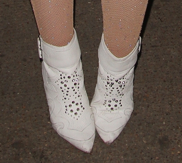 Iggy Azalea wearing white studded KG Kurt Geiger Wyatt boots