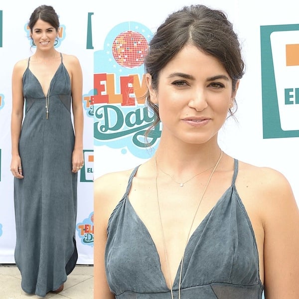 Nikki Reed wearing a maxi dress paired with Rag & Bone Classic Newbury booties to host 7-Eleven's 86th Birthday Bash at The Revolve Clothing Malibu Beach House in Los Angeles, California, on July 9, 2013