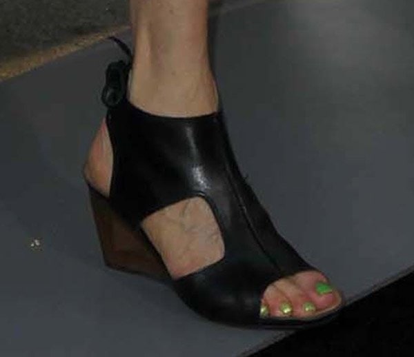 Catherine Hardwicke wearing leather open-toe sandal booties featuring cutouts