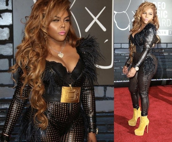 Lil Kim wore what looked like a leather jumpsuit with holes