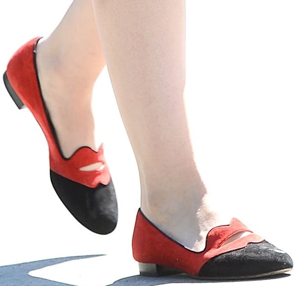 Ginnifer Goodwin wearing Charlotte Olympia 'Bisoux' smoking loafers featuring a cap toe and pouty, lip-shaped collar