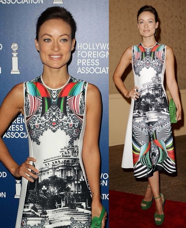 Olivia Wilde wore a beautiful frock from Clover Canyon with a green clutch and a pair of green ankle-strap sandals, both from Jimmy Choo