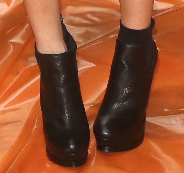 Ellie Goulding wearing Chelsea booties with neoprene detail and double platforms