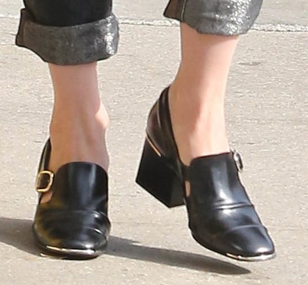 January Jones wearing black leather Balenciaga loafers