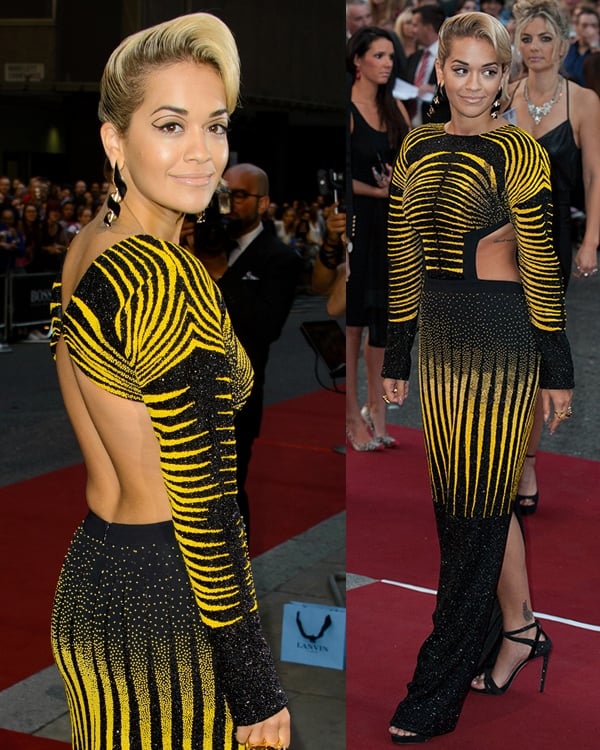 Rita Ora arrived in a stunning Etro Fall 2013 yellow-and-black microbeaded gown featuring cutout sides and back