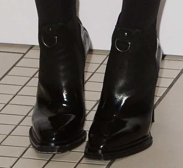 Hailee Steinfeld wearing cutting-edge McQ Alexander McQueen patent suede booties