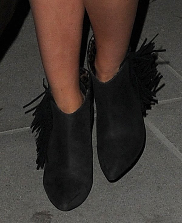Mollie King wearing fringe boots by Betsey Johnson
