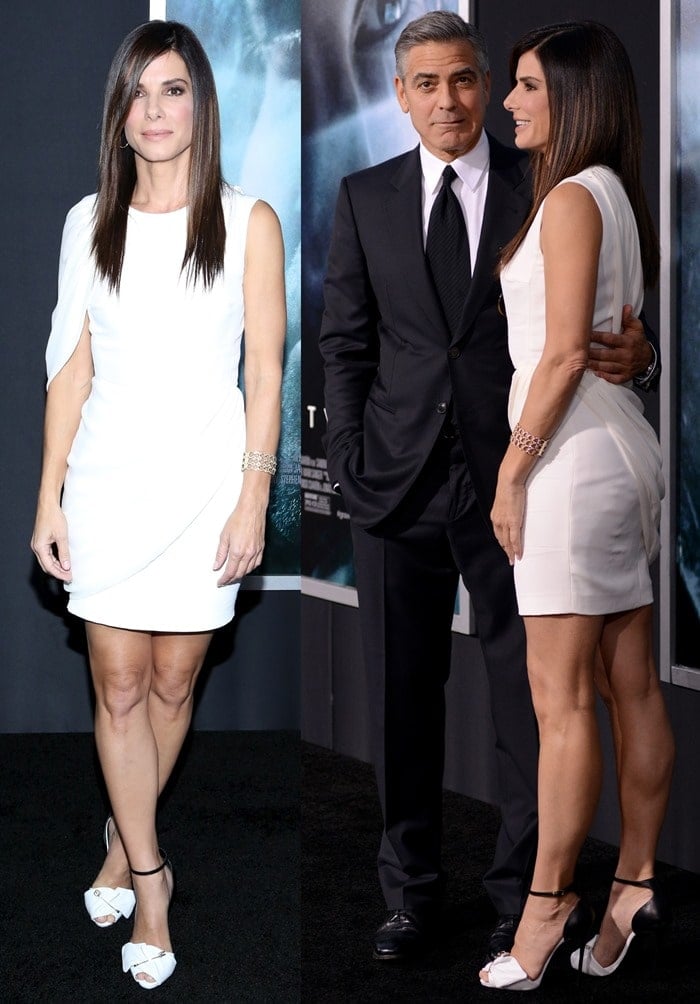 Sandra Bullock, with George Clooney, looking classy in a white dress and black-and-white pumps at the premiere of 'Gravity' held at AMC Lincoln Square Theater in New York City, New York, on October 1, 2013