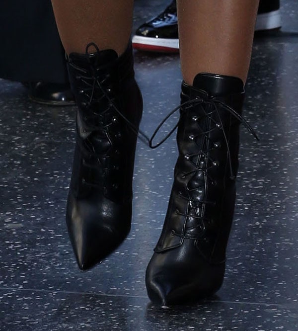 Toni Braxton showing off her hot legs in Christian Louboutin Mado ankle boots