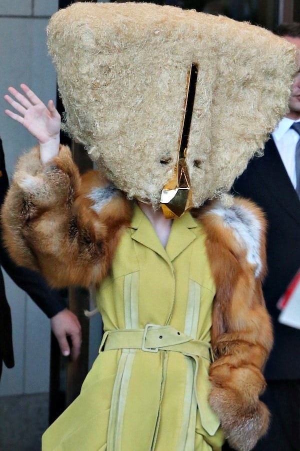 Her gigantic fur-covered headpiece was from the haute couture Fall/Winter 2013 collection of Charlie Le Mindu