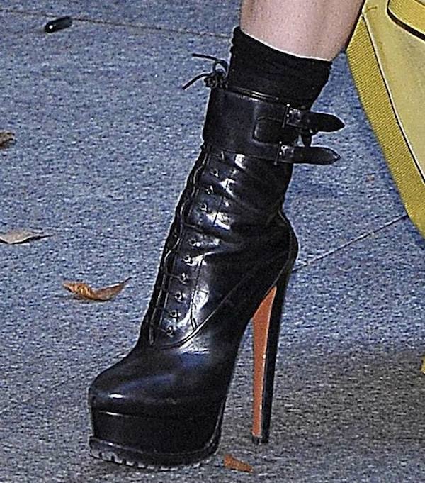 Lady Gaga finished off her look with a familiar pair of lace-up platform boots from Azzedine Alaïa