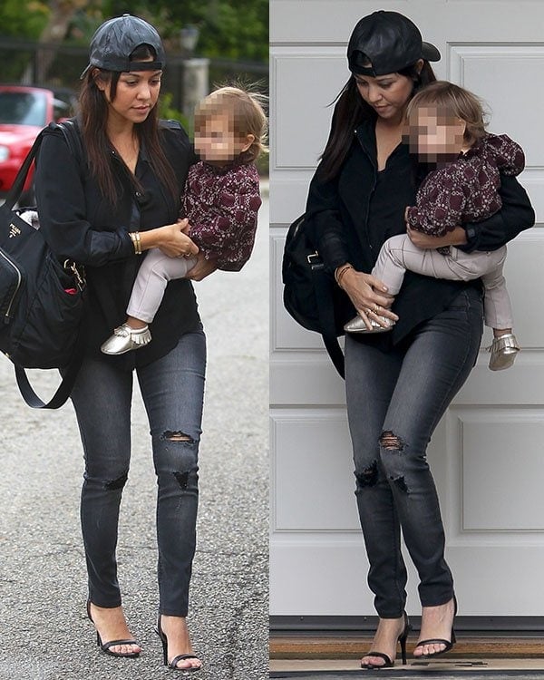 Kourtney Kardashian looking rather boyish in a very laid-back ensemble when she brought her daughter, Penelope, to a baby class in Beverly Hills recently