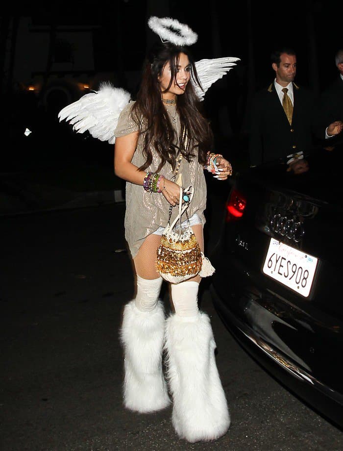 Wearing a costume complete with fishnet stockings, a halo, wings, and fluffy knee-high boots, Vanessa Hudgens looked like a sexy angel sent from heaven
