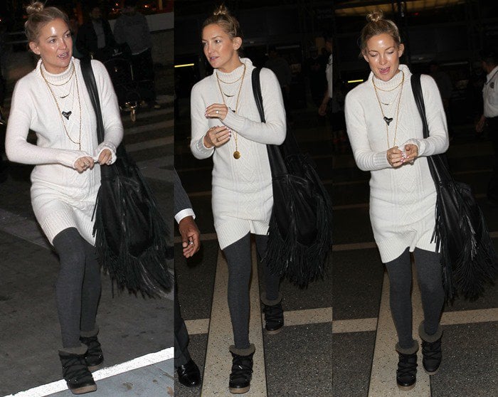Kate Hudson walks through Los Angeles International Airport