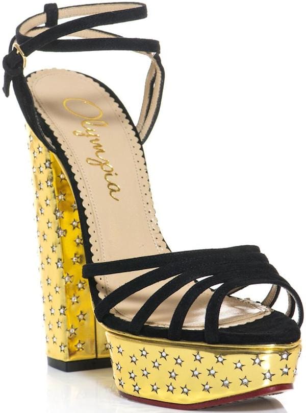 Rising Star sandals with black suede straps and metallic gold heels and platforms
