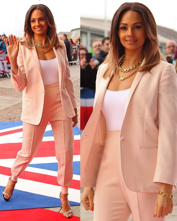 Alesha Dixon wore a Whistles pink coat over a plain white top and a pair of pink trousers