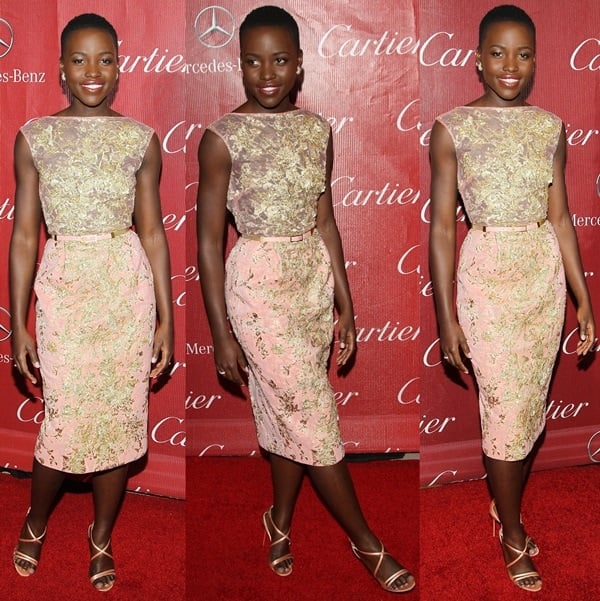 Lupita donned a coral sleeveless dress with gold brocade embellishments from the Elie Saab Fall 2012 couture collection