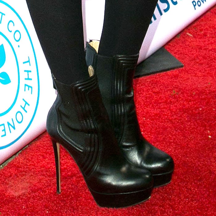 Jessica Alba sporting black platform booties
